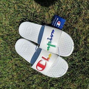 Champion, white/rainbow slides.     Sz 10